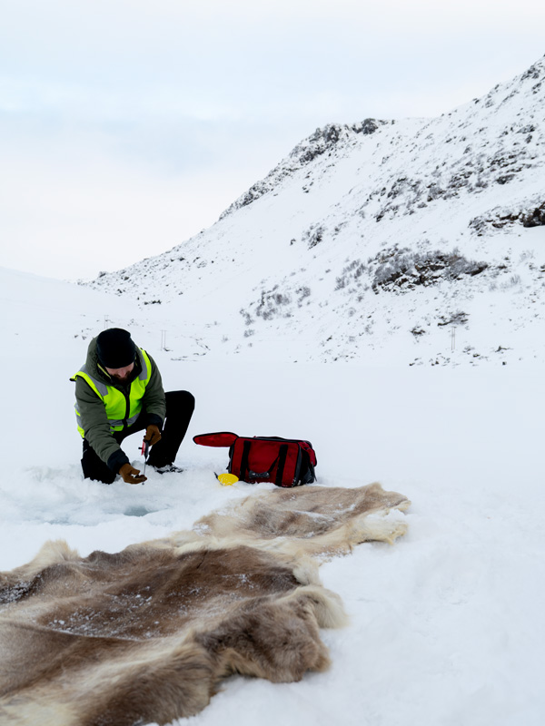 ice fishing in the Arctic