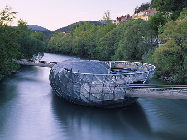 A contemporary architectural gem, Murinsel floats on the Mur River, offering unique views of Graz.