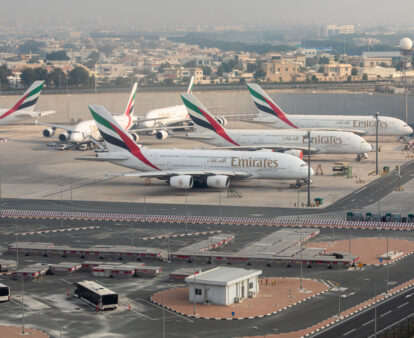 Emirates airplanes parked at Dubai International Airport