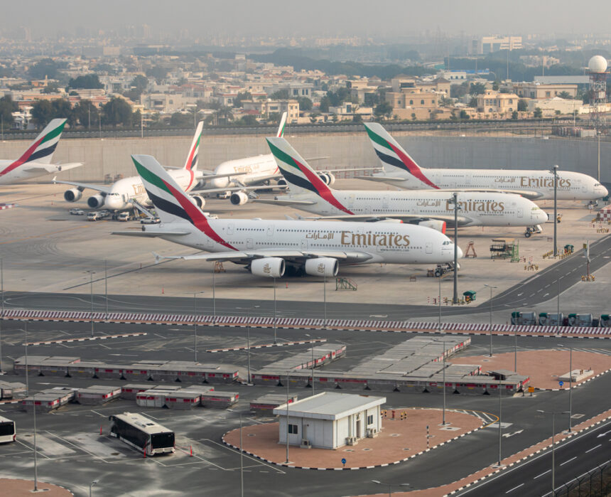 Emirates airplanes parked at Dubai International Airport