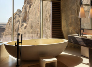 a bathtub with a view at Desert Rock Resort, Saudi Arabia