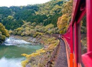 Sagano Romantic Train in japan going over water