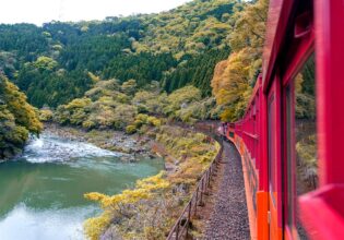 Sagano Romantic Train in japan going over water