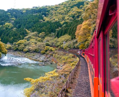 Sagano Romantic Train in japan going over water