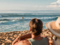 watching a surfer at Sunset Beach, Oahu