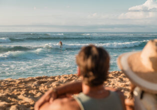 watching a surfer at Sunset Beach, Oahu