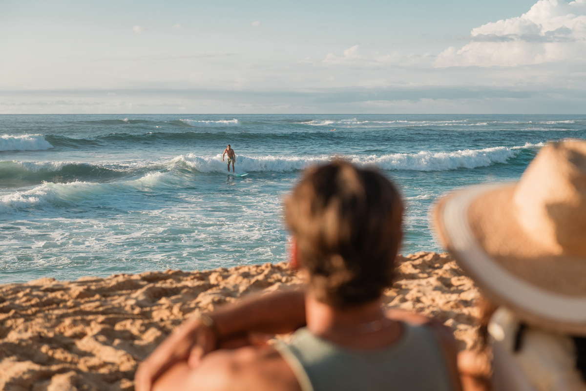 watching a surfer at Sunset Beach, Oahu
