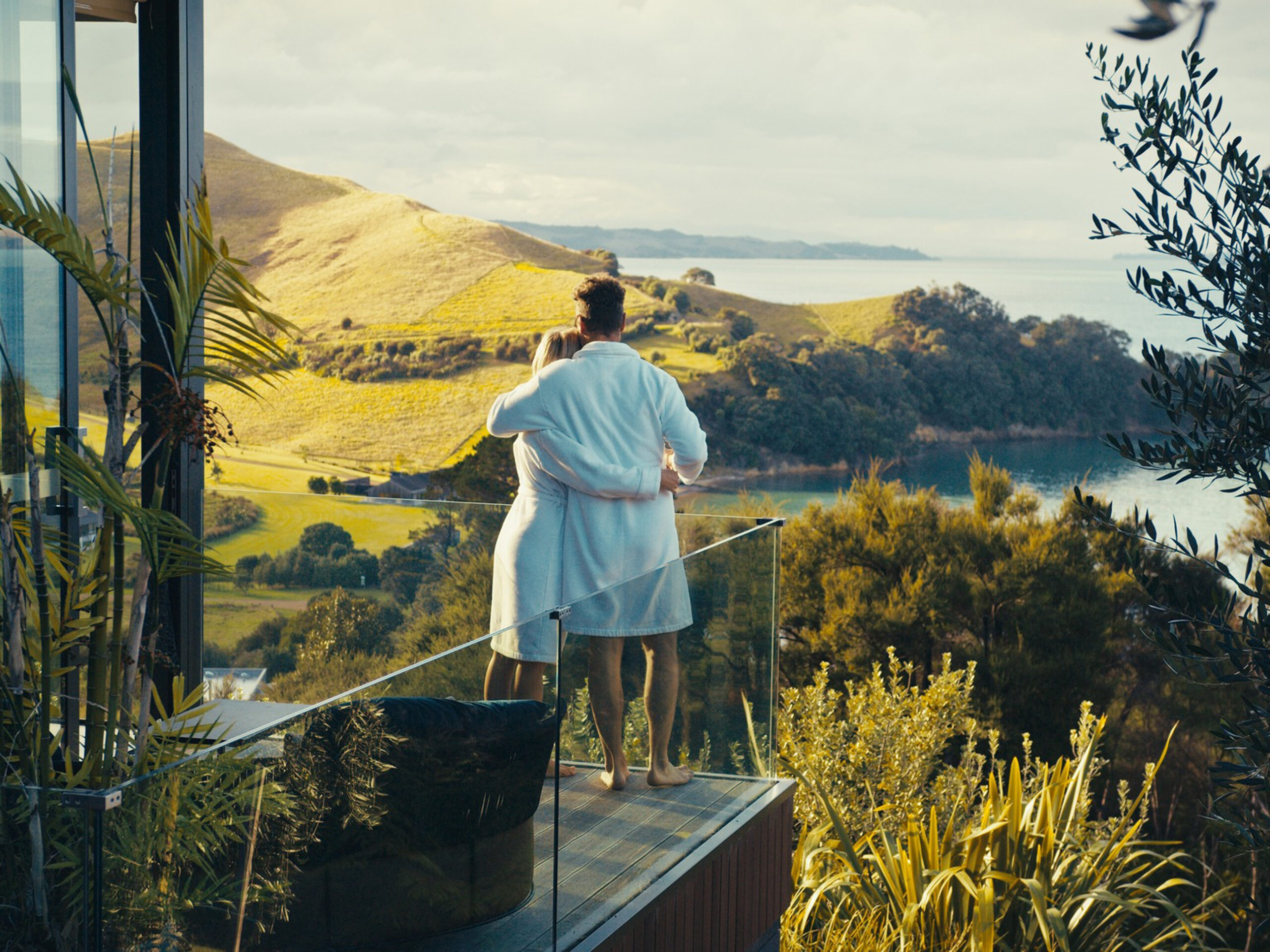 a couple admiring the view at Omana, Waiheke Island