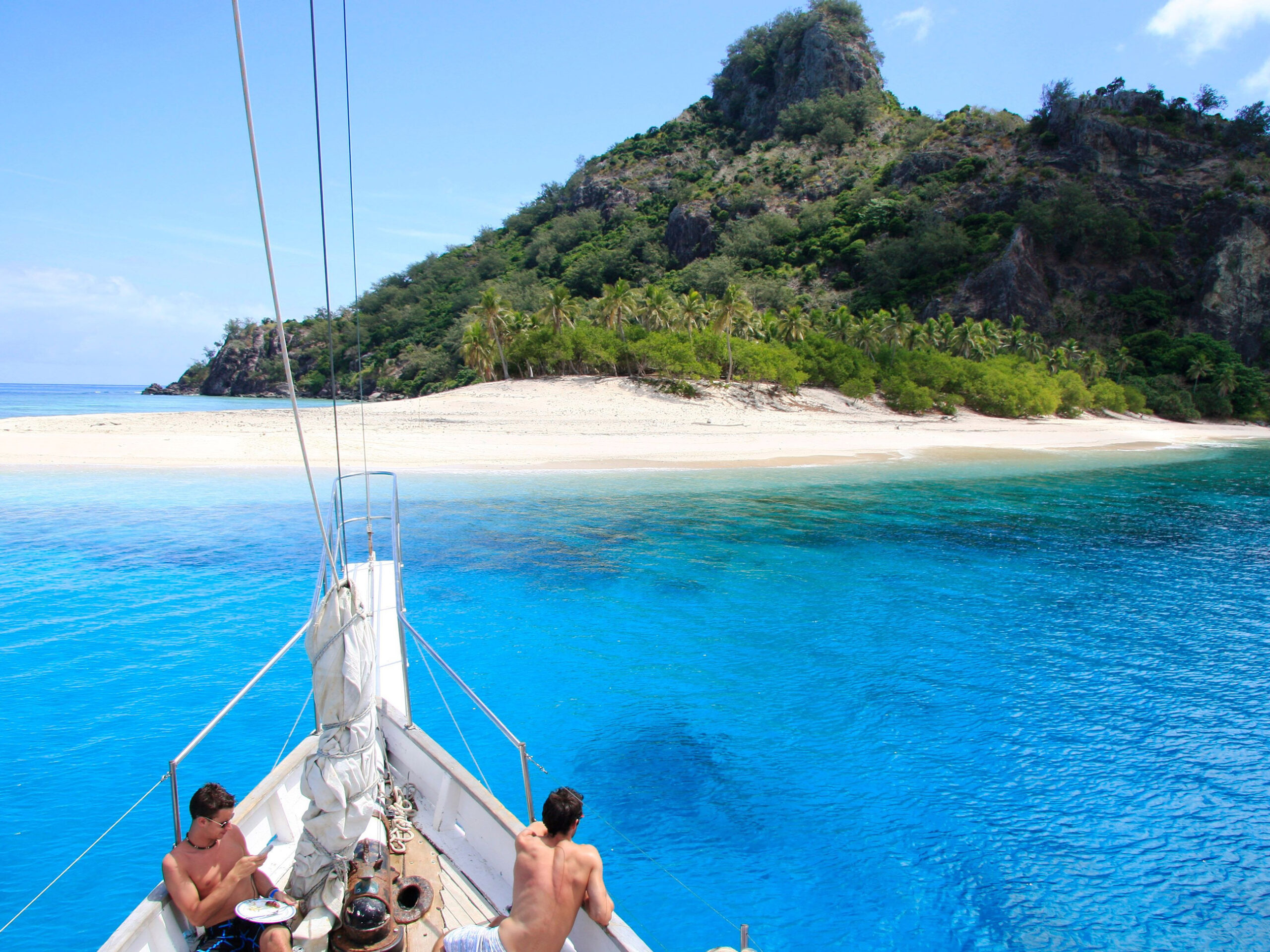a boat arriving at Monuriki Island, Fiji